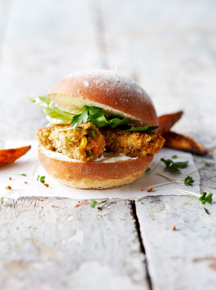 Veggie 'fish fingers' in a burger bun on a table