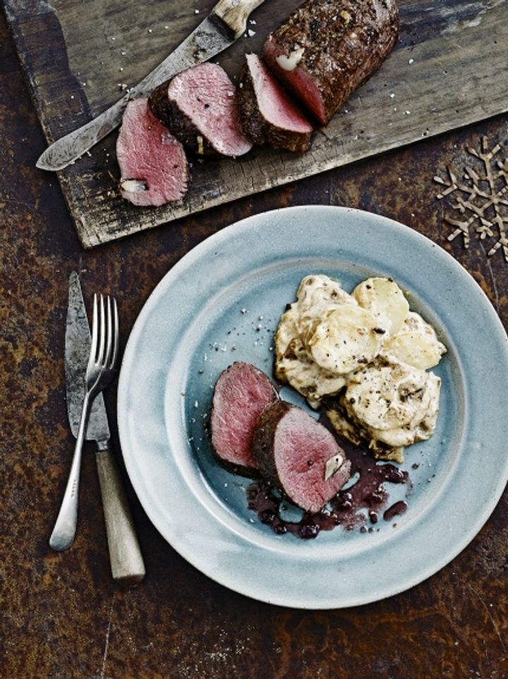 roasted venison sliced with potato dauphinoise on the side