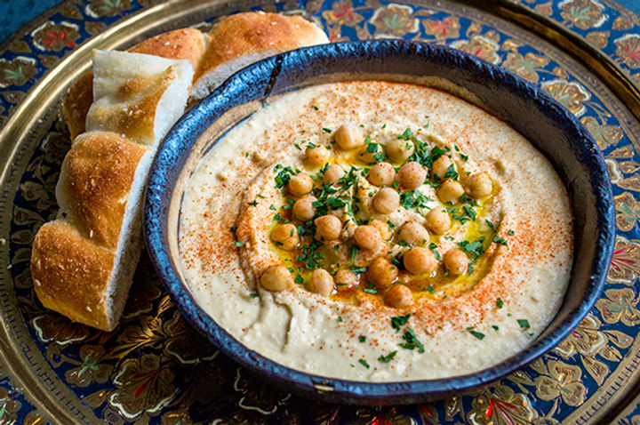 Image of a bowl of houmous