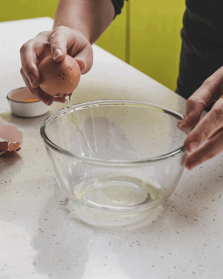GIF of eggs being cracked into a bowl