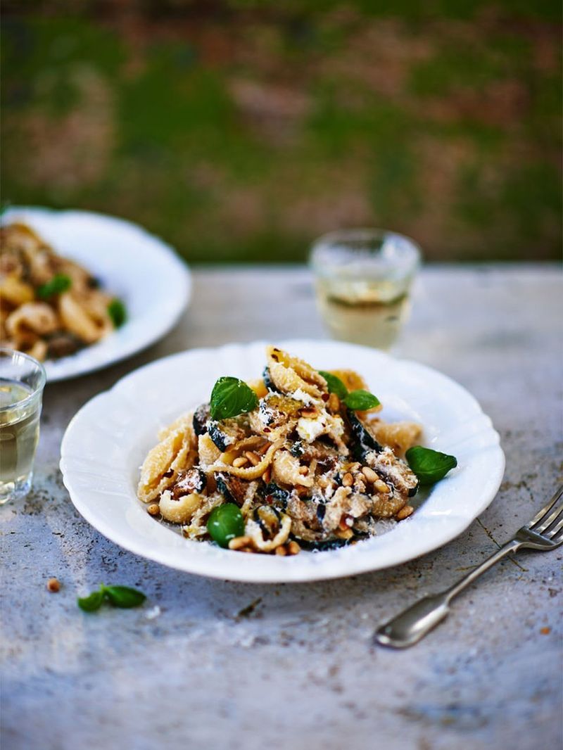Slow-cooked courgette & pine nut pasta