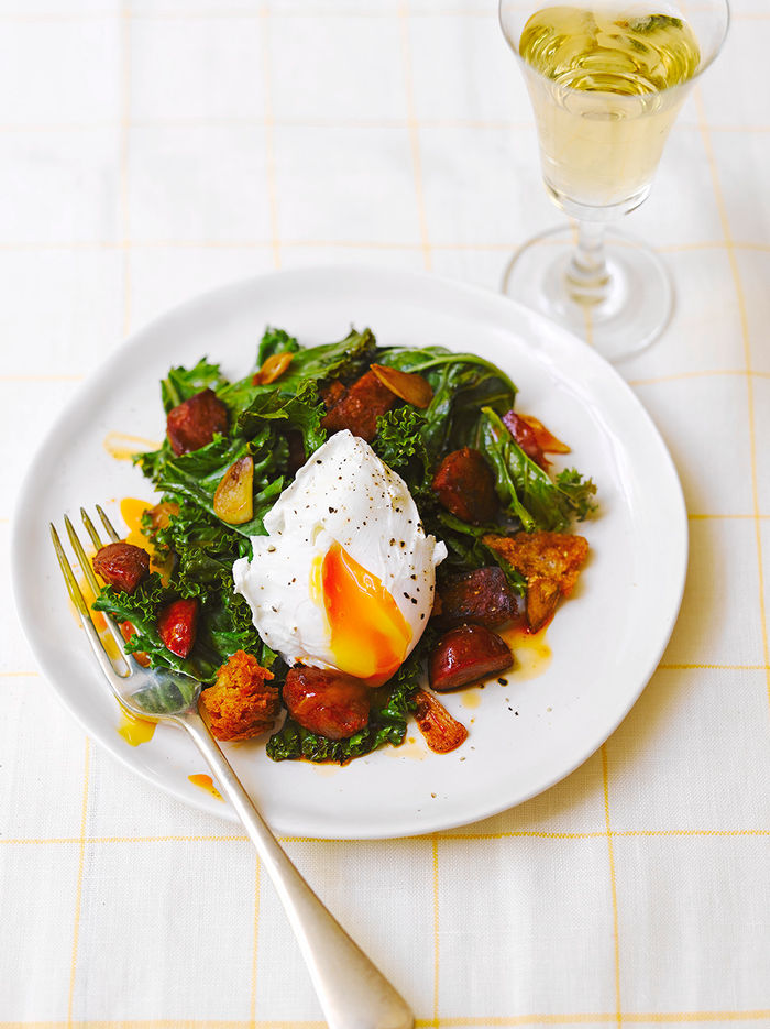 Kale, fried chorizo & crusty croutons with a poached egg