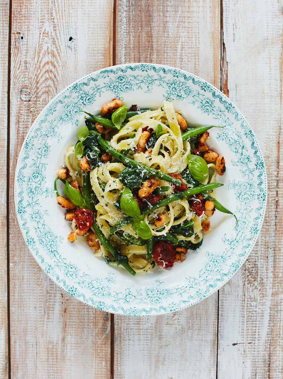 DIY basil pesto tagliatelle with tomatoes beans greens