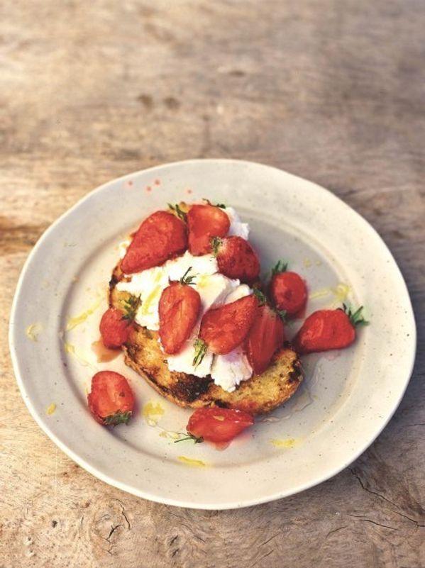 Charred eggy bread with strawberries and honey