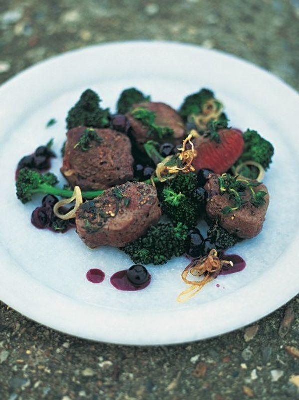 Pan-seared venison with blueberries, shallots and red wine