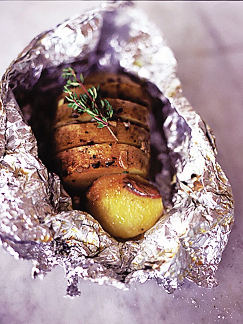 Garlic, thyme and anchovy baked potatoes