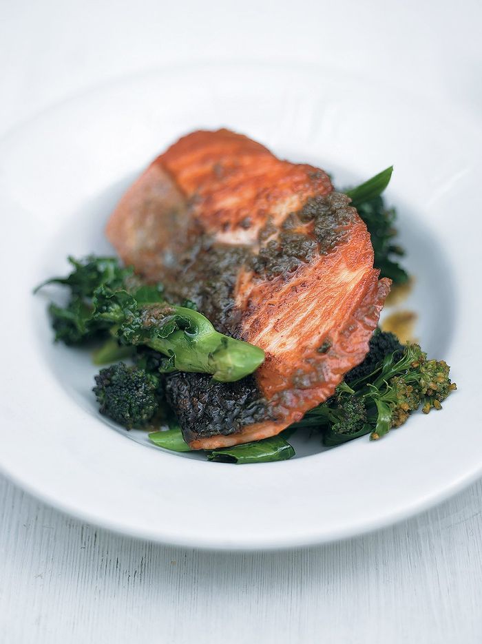 Pan-roasted salmon with purple sprouting broccoli and anchovy-rosemary sauce