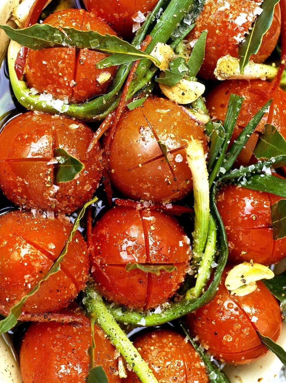 Slow roasted balsamic tomatoes with baby leeks and basil