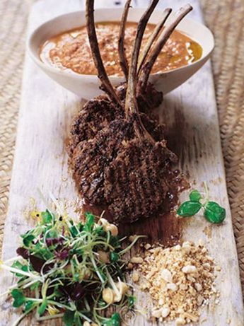 Barbecued lamb lollipops with spiked houmous & nuts
