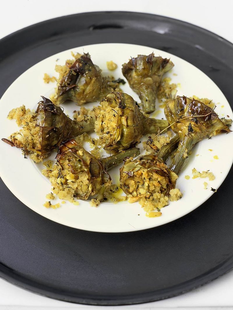 Tray-baked artichokes with almonds, breadcrumbs and herbs