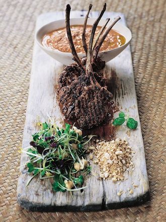 Spiced lamb lollipops with korma sauce and toasted almonds