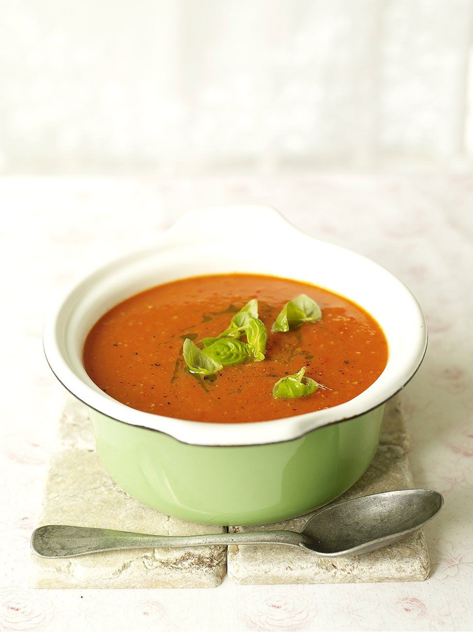 Abundance tomato soup with basil oil