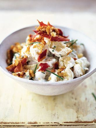New potato salad with soured cream, chives and pancetta