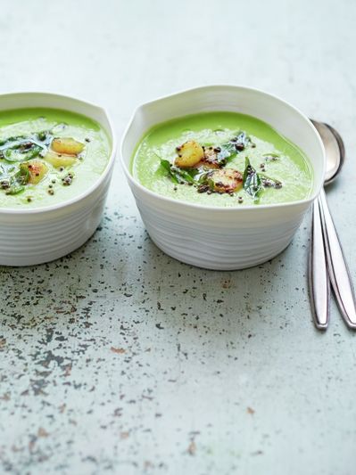 Summery pea soup with turmeric scallops